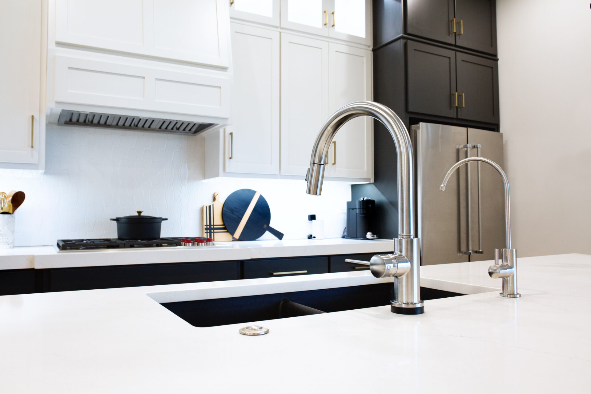 Close-up photos of a kitchen faucet and sink