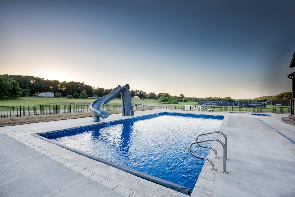 large rectangular pool with slide 