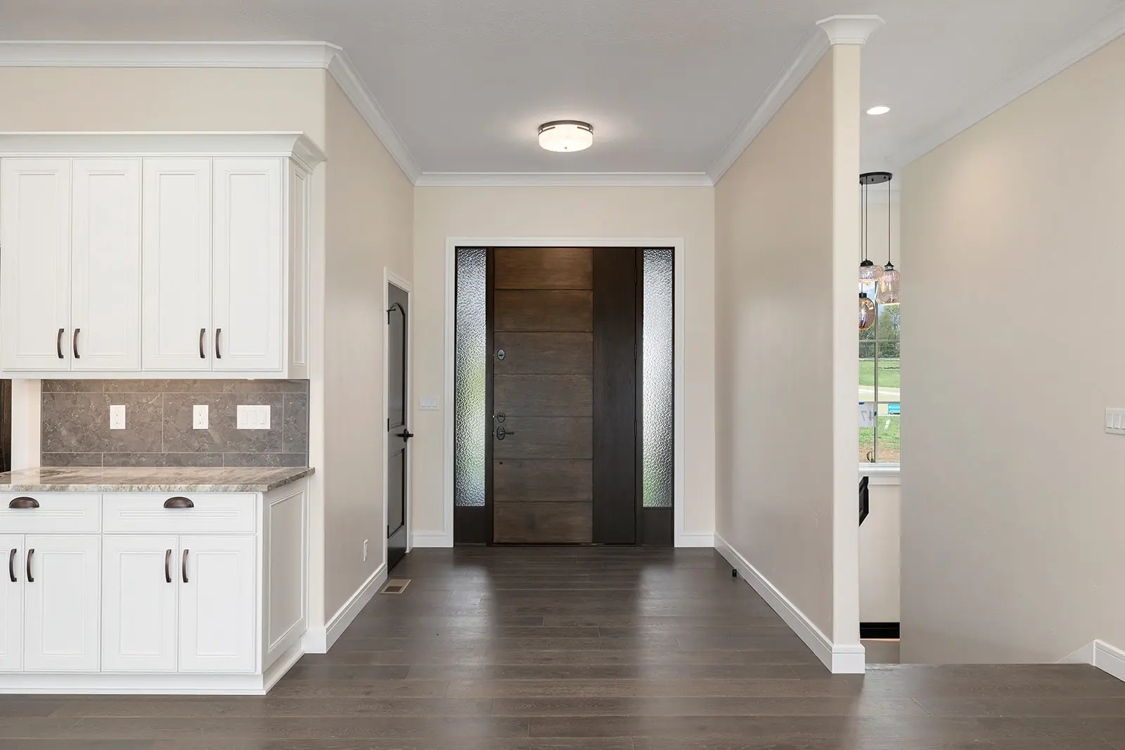 image of luxurious door between cabinets and stair