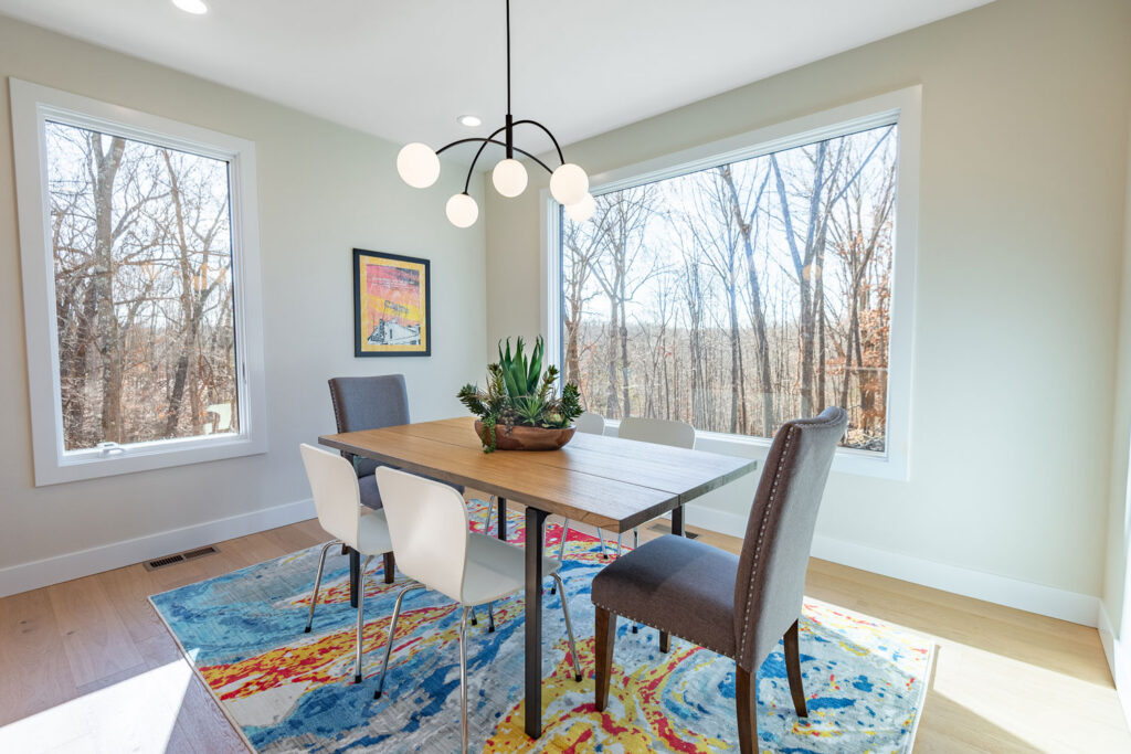 Dining area with chandelier - Rogersville, MO